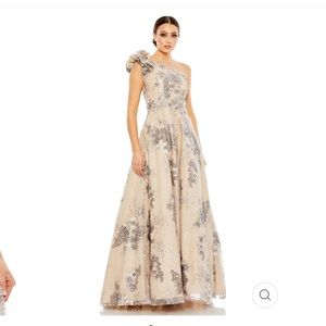 Dress worn one time for a wedding. No stains or imperfections, never altered.